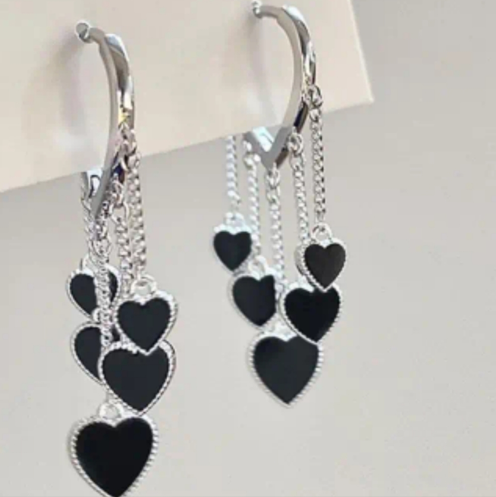 Womans heart dangle earrings